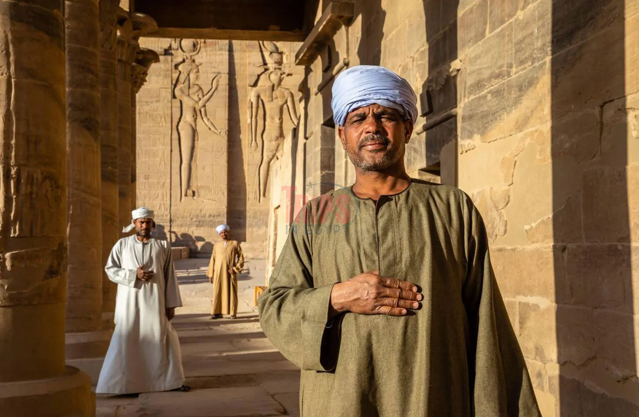 Nubian Egyptian During Sunset at Temple of Isis - Trips in Egypt
